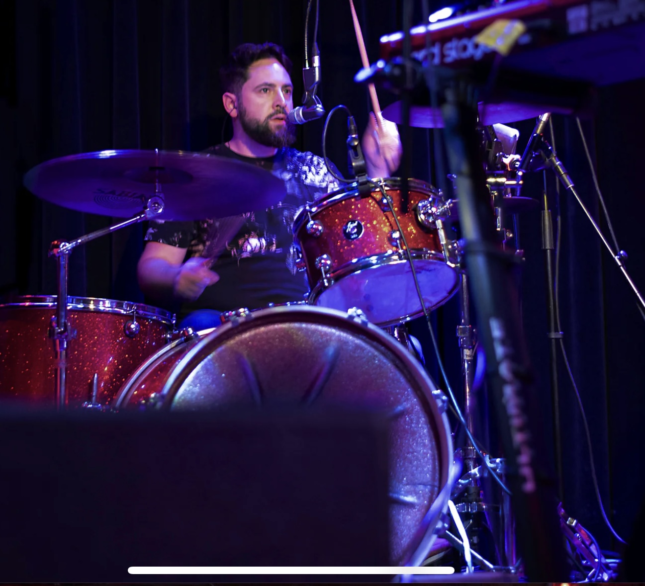 Francis drummer performing live — close-up shot