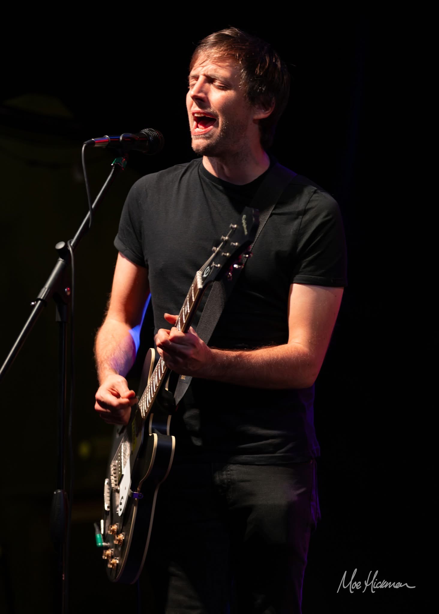Alex Wesley — Francis vocalist and frontman performing live