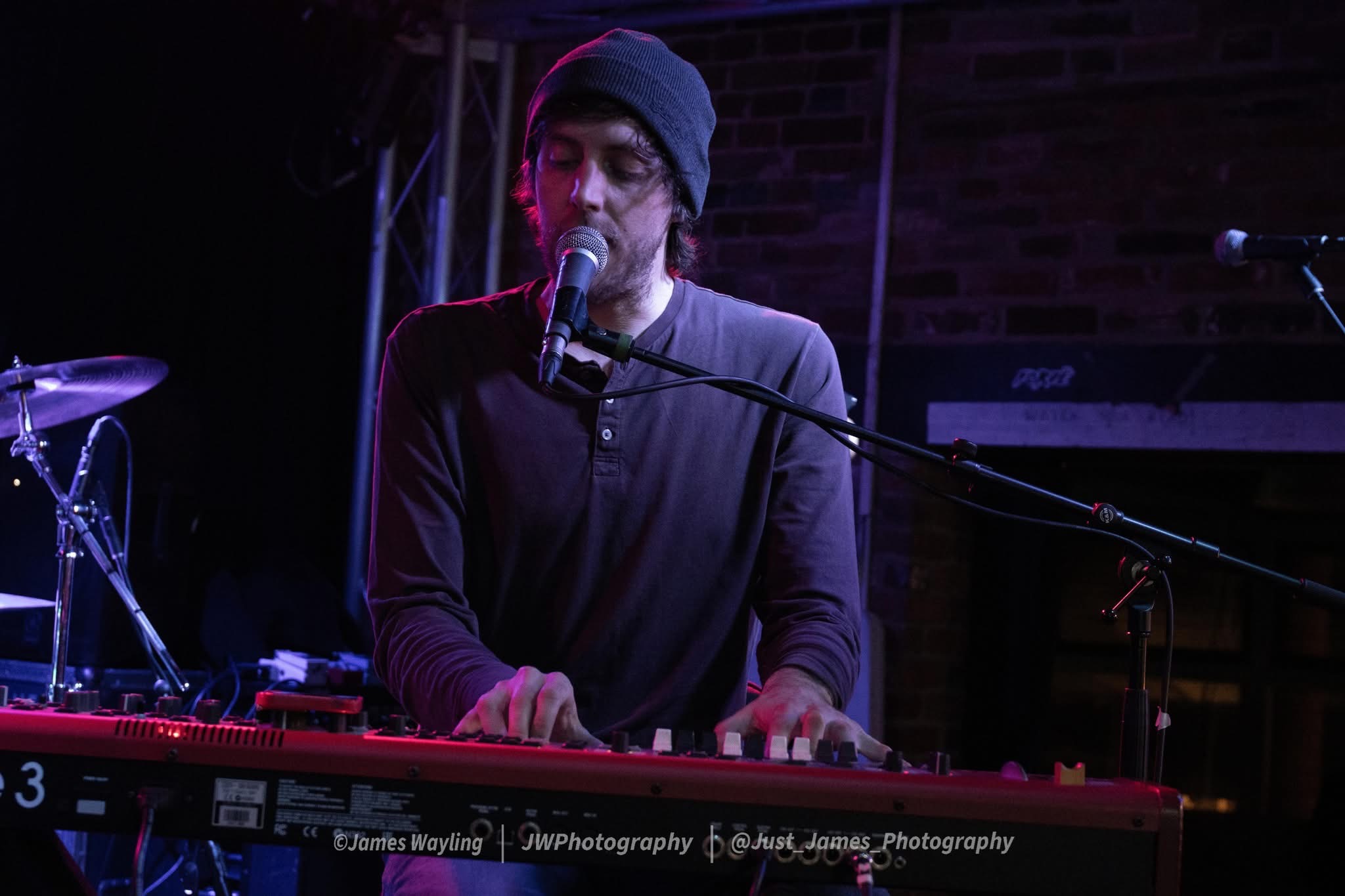 Francis keys player and vocalist close-up, performing live